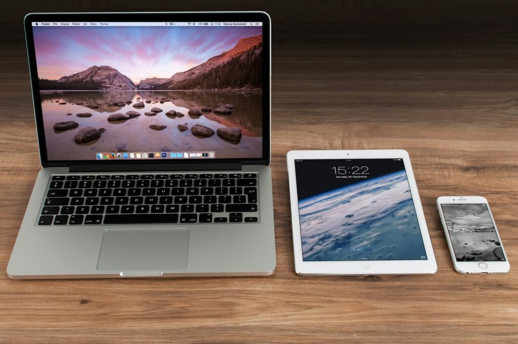 Mobile-responsive WordPress website designed by Explozet loading on smartphone and laptop